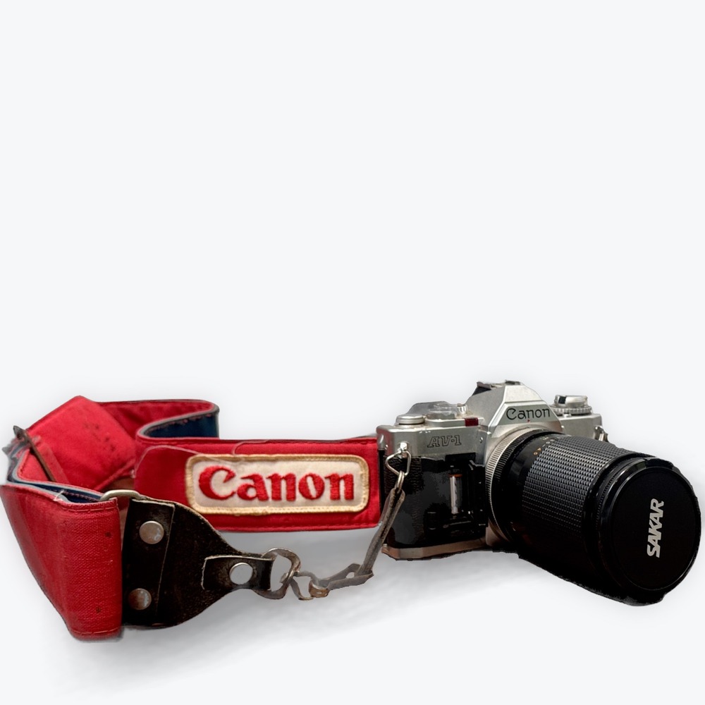 Canon AV 1 35mm SLR Film Camera Silver Sakar 35 135mm Lens Strap Untested
